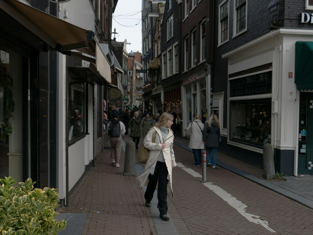 People walking down an alley in Europe