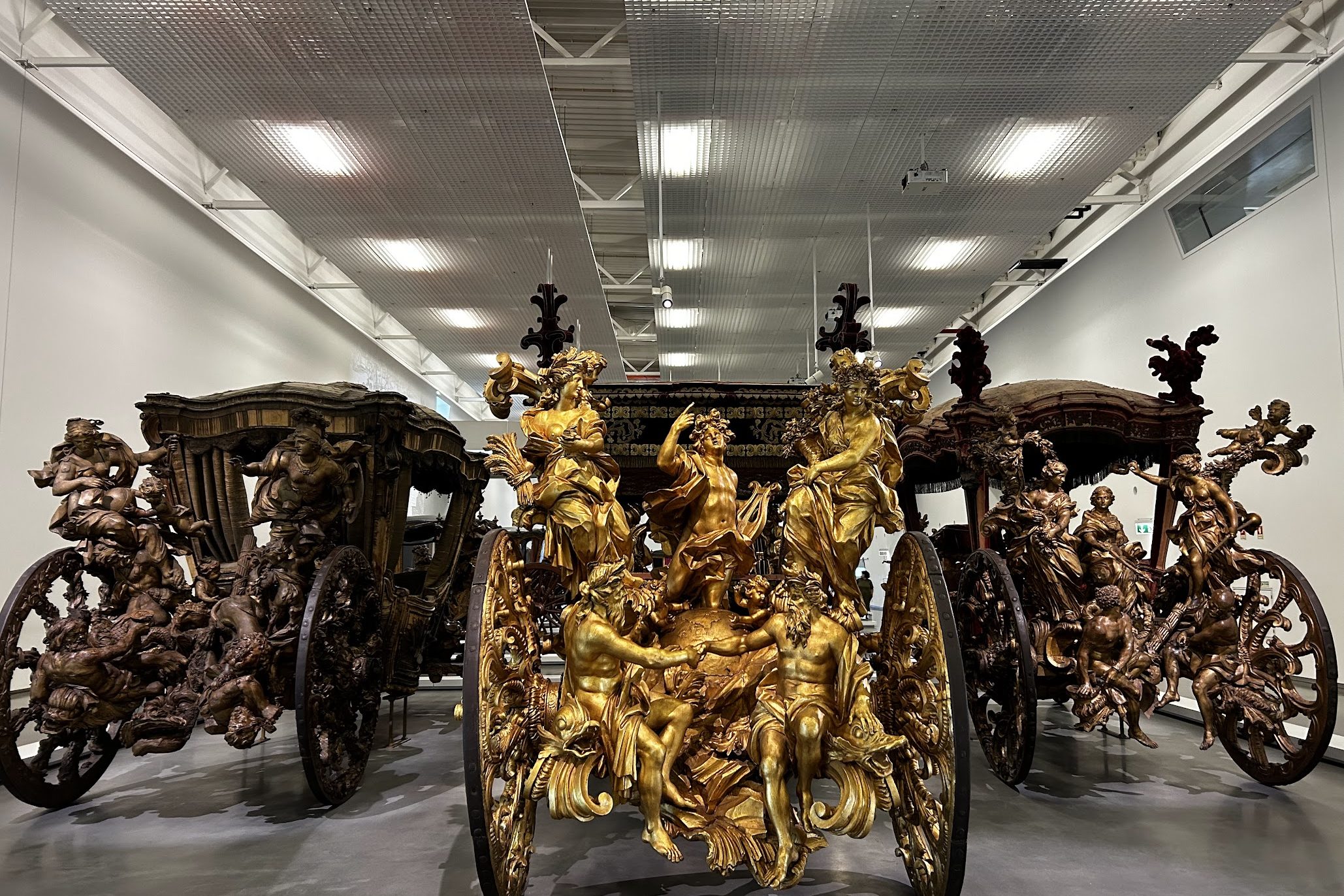 Golden carriages in a museum